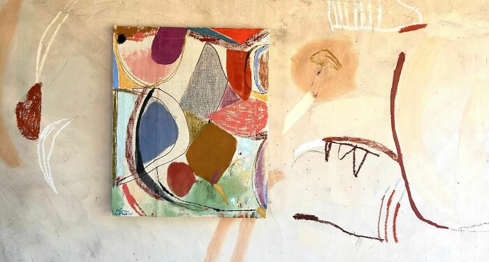A vibrant abstract painting by Heather Chontos, showcasing creative art with various shapes and colors.