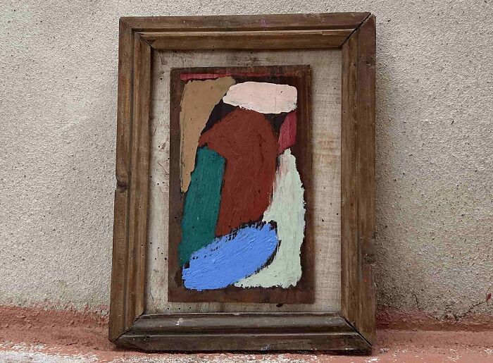 A framed piece of creative art by Heather Chontos, featuring abstract shapes and vibrant colors.