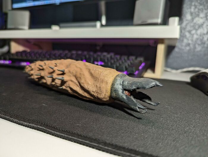 A detailed 3D printed model of a sand worm from Dune, highlighting the brilliant stuff created with 3D printers.