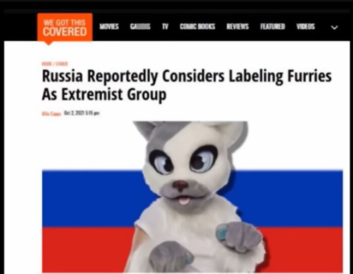 A headline: Russia Reportedly Considers Labeling Furries As Extremist Group, with a furry in front of a Russian flag, creating comedy.