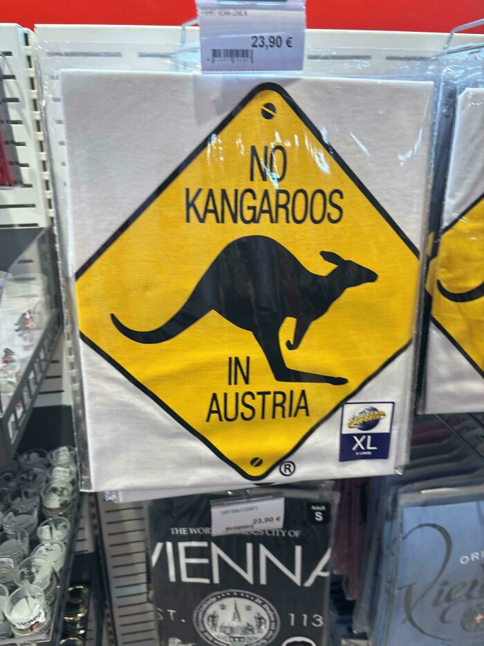 Hilarious and weird things spotted at airports: a T-shirt with 'NO KANGAROOS IN AUSTRIA' sign for sale.
