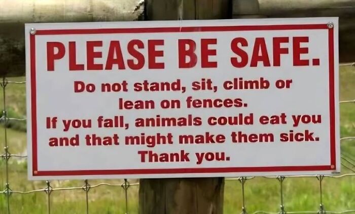 A funny sign warning to please be safe, implying if you fall, animals could eat you and get sick.