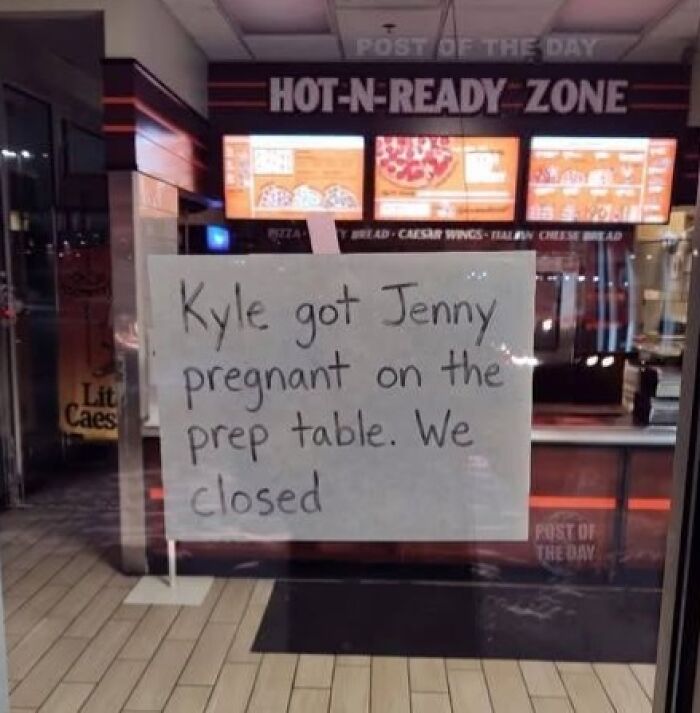 A silly-funny sign on a glass door, Kyle got Jenny pregnant on the prep table. We closed.
