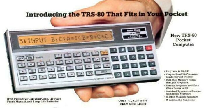 A hand holding a TRS-80 Pocket Computer, a compact piece of 80s retro tech, displaying program code.
