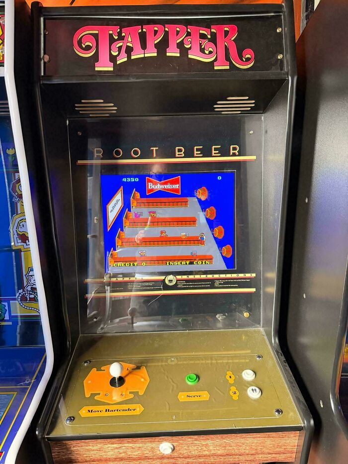 A Tapper arcade game from the 80s, an example of retro tech capturing the glorious weirdness of the era.