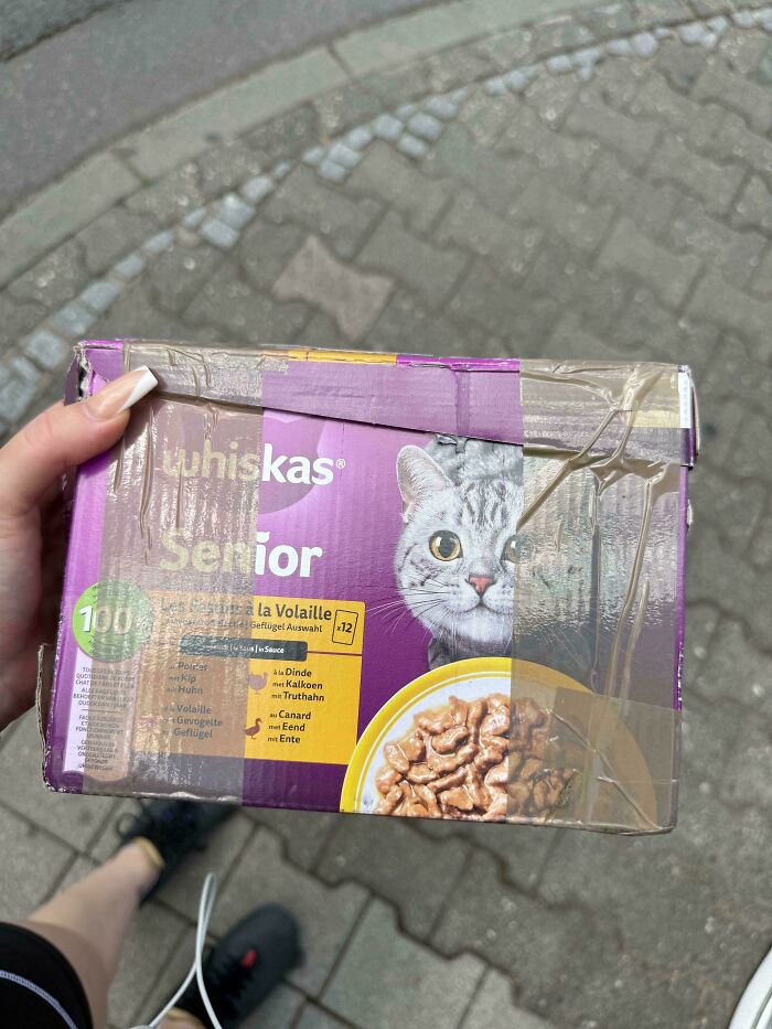 A poorly packaged box of Whiskas Senior cat food, highlighting unhinged Vinted posts.
