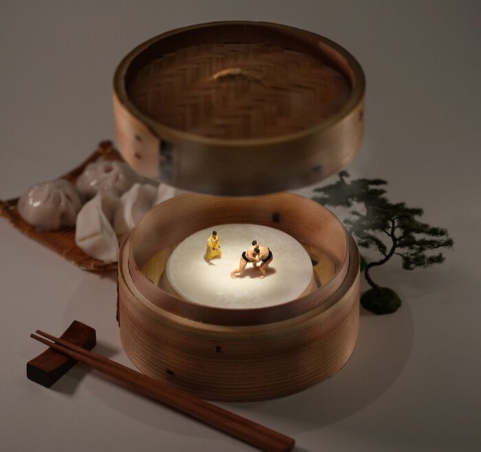 Miniature Calendar work by Tatsuya Tanaka of sumo wrestlers in a dim sum steamer with chopsticks.