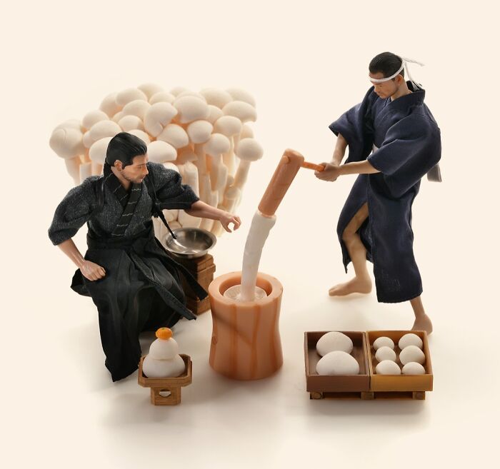 Miniature Calendar work by Tatsuya Tanaka: small figures pounding mochi next to a pile of mushrooms.