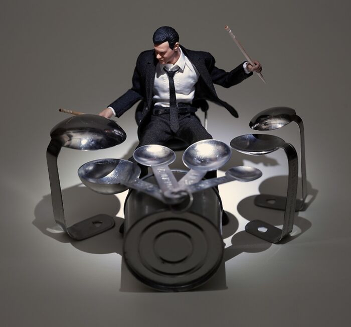 A miniature calendar work by Tatsuya Tanaka, featuring a tiny drummer playing a drum kit made of measuring spoons.