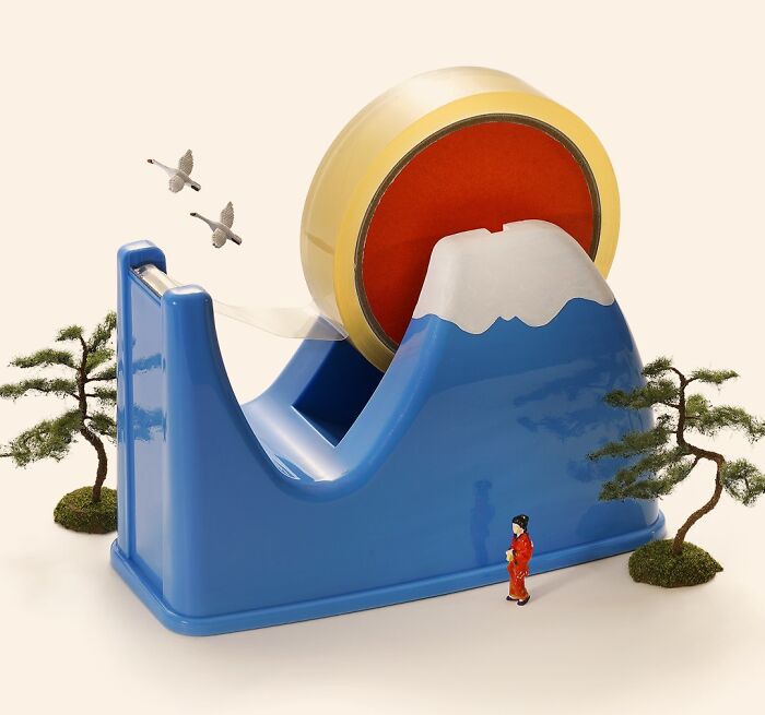 Miniature Calendar work by Tatsuya Tanaka with a tiny figure admiring a tape dispenser as Mount Fuji.