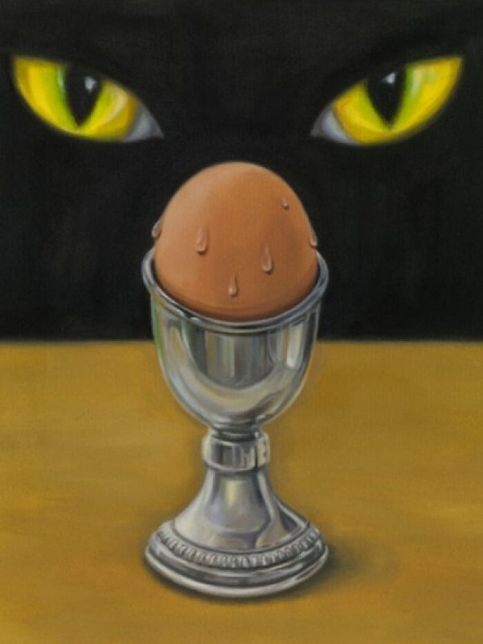 A surreal image of bright yellow cat eyes in the dark, watching a perfectly placed egg in a silver egg cup.
