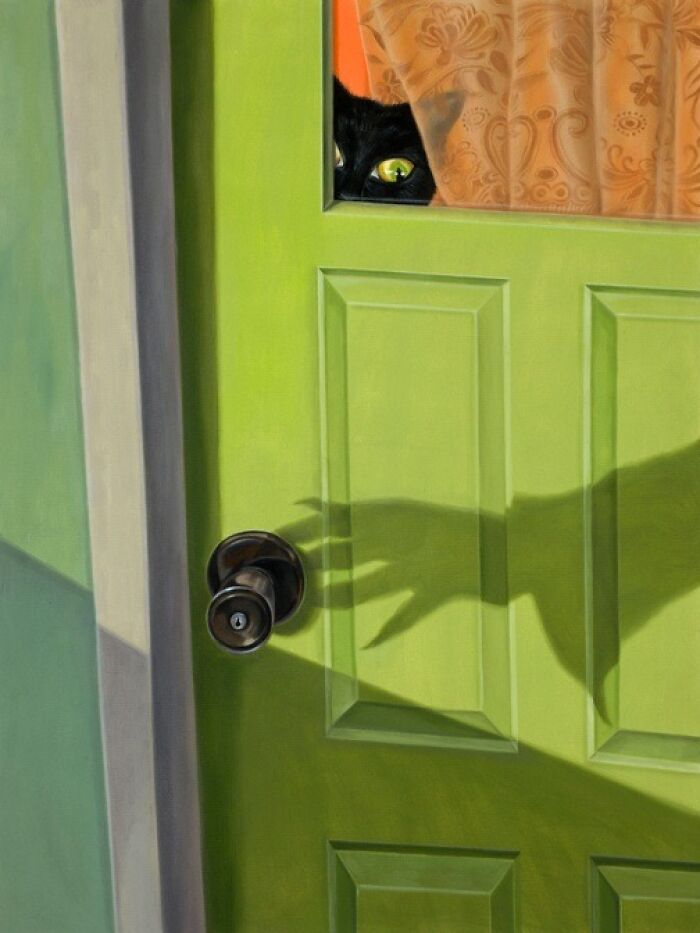 A black cat peeks through a window above a green door, a shadowy hand reaching for the doorknob, creating a surreal moment.