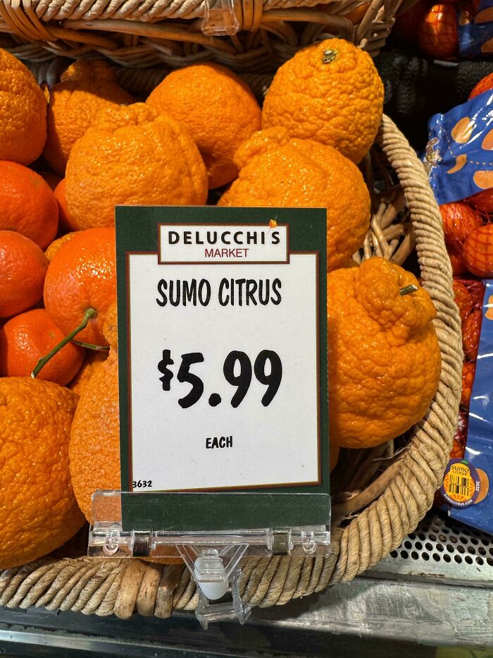 Sumo citrus priced at $5.99 each at Delucchi's Market, reflecting the sad world of rising food costs.