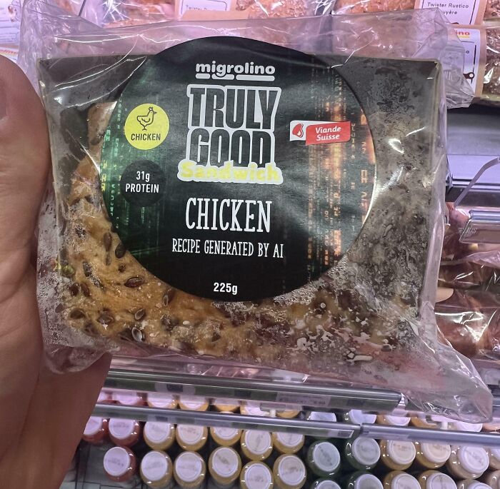 A packaged Migrolino Truly Good Chicken sandwich, with 'recipe generated by AI', reflecting a sad world trend.