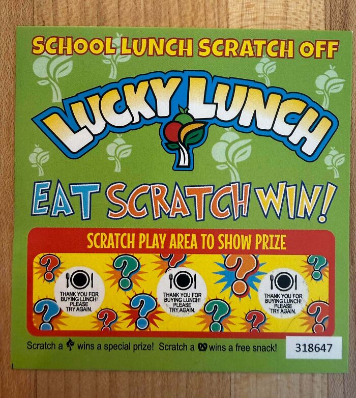 A School Lunch Scratch Off lottery ticket, symbolizing aspects of the horrid and sad world.