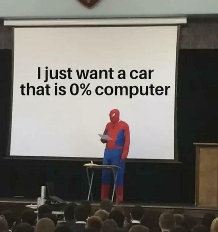 A funny meme of Spider-Man presenting a slide about wanting a 0% computer car, dealing with hard day.