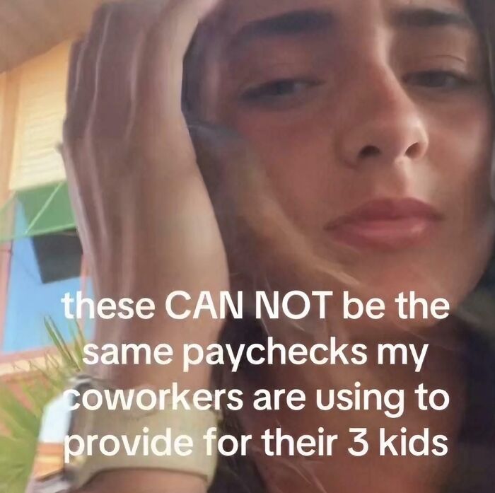 A funny meme of a woman looking distressed, questioning how coworkers can provide for kids with low paychecks.