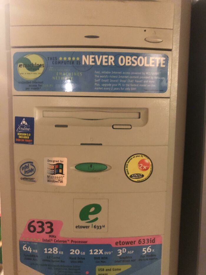 An old computer tower with stickers, demonstrating how technology beliefs and words age over time.