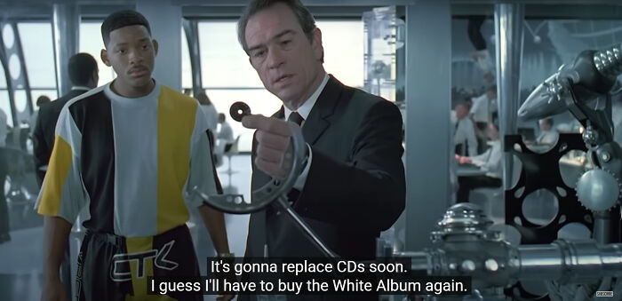 Will Smith and Tommy Lee Jones in Men in Black discussing CDs, a belief that aged badly.