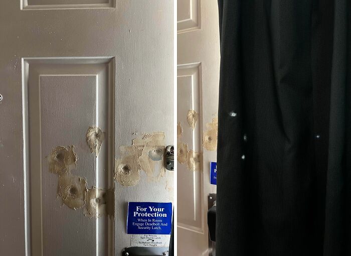 A truly bizarre white door with multiple bullet holes and repairs, and a dark curtain with light spots.