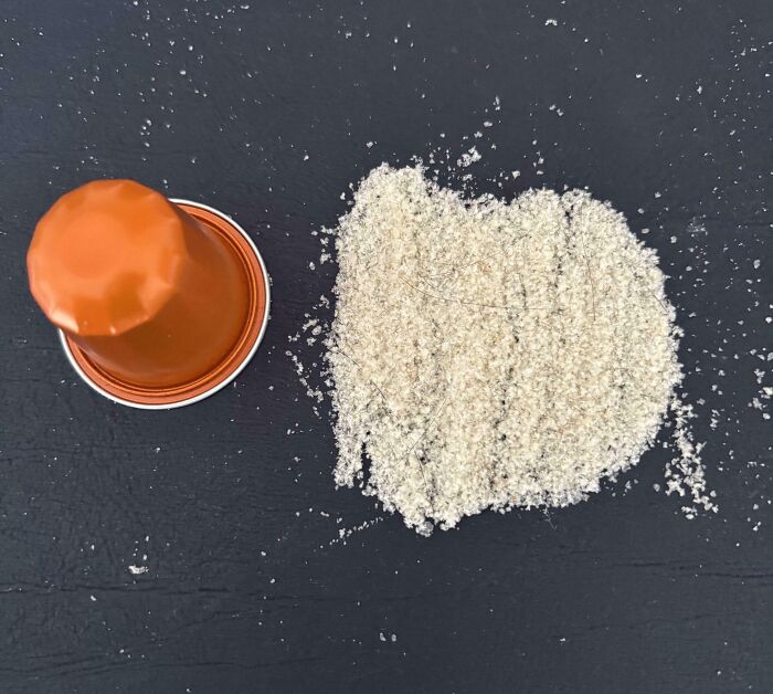 Truly bizarre coffee pod next to a pile of ground bones, showing things people had to take a photo of to make sure they're not hallucinating.
