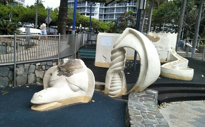 A playground with abstract, sculptural elements that appear poorly designed, one of many playground fails.