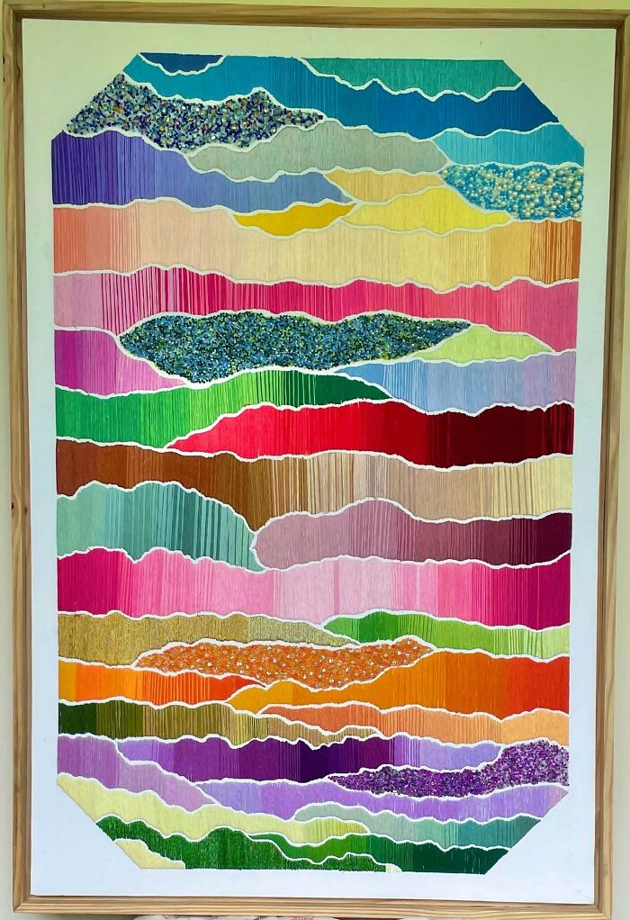 Large colorful abstract landscape art with textured layers among creative embroidery projects