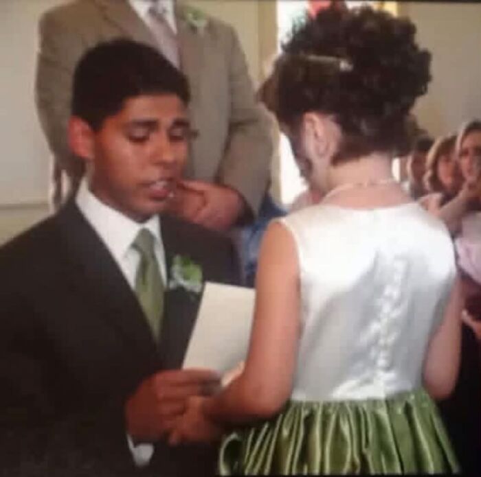 A young man and woman at a wedding ceremony, sweet proof of finding the right man.