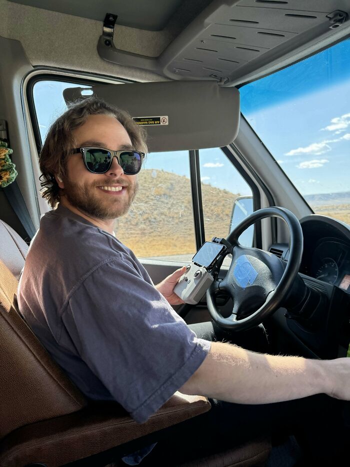 A happy man in sunglasses sitting in a car, proof of finding the right man.