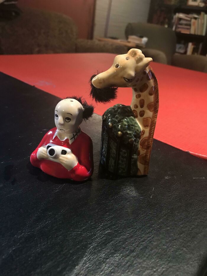 Unhinged secondhand finds: A unique salt and pepper shaker set with a man and a giraffe.