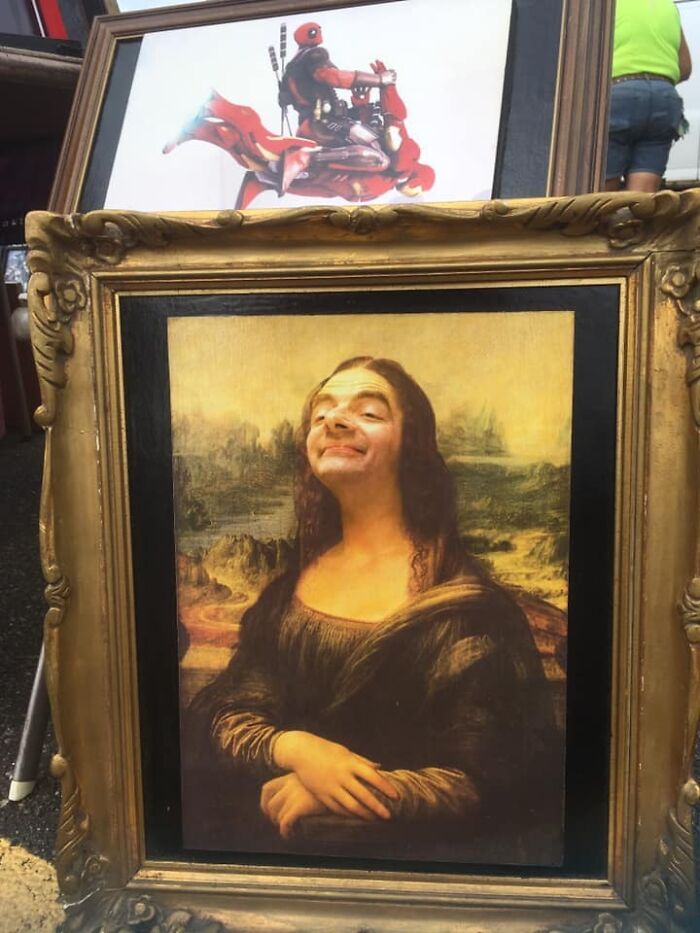 A humorous painting of the Mona Lisa with Mr. Bean's face, a cursed treasure secondhand find.
