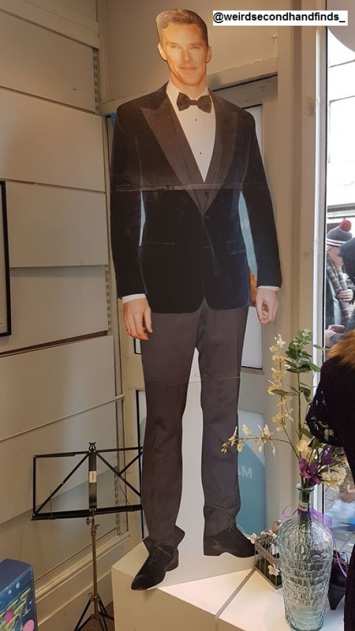 A cardboard cutout of a man in a tuxedo, one of the unhinged secondhand finds.