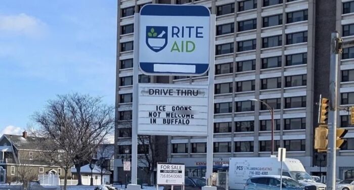 A chaotic good post displaying a Rite Aid sign with a humorous message about ice cream, inspiring you to be the hero.