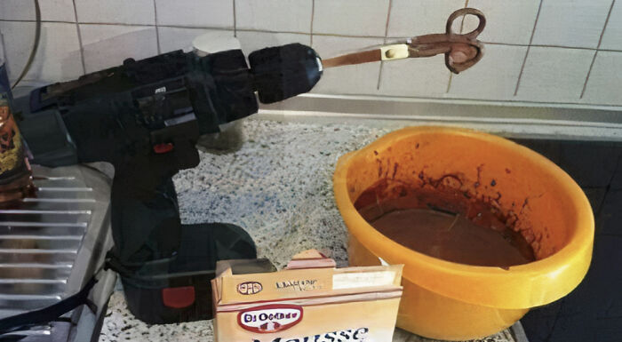 Hilarious photo of a power drill used to mix mousse with scissors, a creative and funny internet moment.