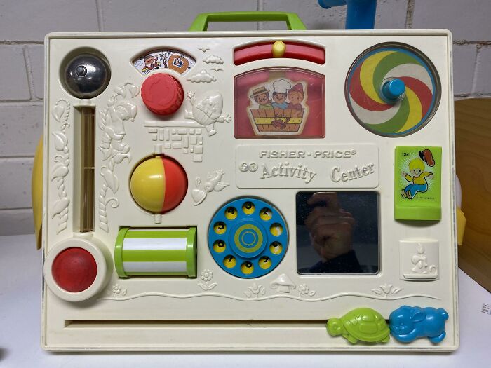 A vintage Fisher-Price Activity Center, a beloved toy bringing back Aussie memories.