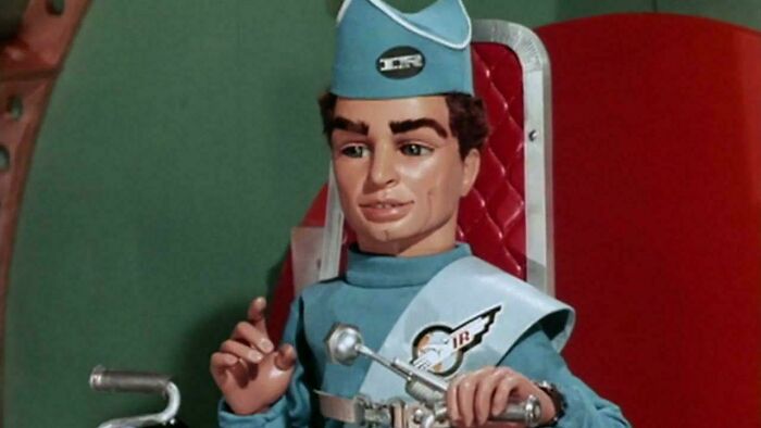A puppet character in a blue uniform, a classic image that brings back nostalgic Aussie memories.