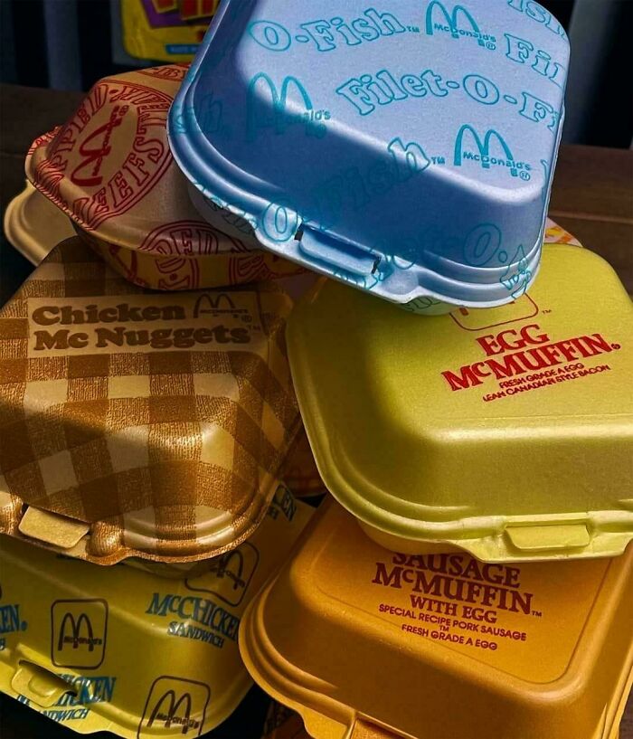 Stack of vintage McDonald's styrofoam containers for Filet-O-Fish, Chicken McNuggets, and Egg McMuffin, bringing back Aussie memories.