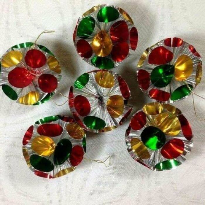 A group of retro, colorful, metallic Christmas tree ornaments, sparking nostalgic Aussie memories.