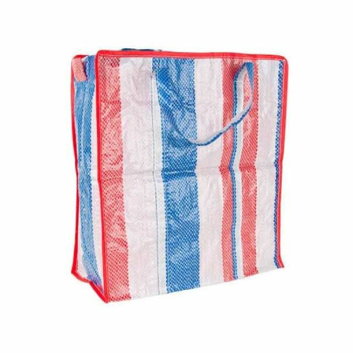 A red, white, and blue striped shopping bag, a common sight bringing back nostalgic Aussie memories for many.