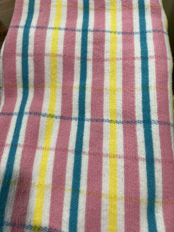 A close-up of a colorful striped towel, a nostalgic Aussie memory.