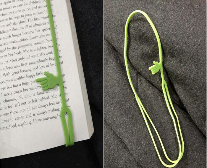 A green silicone bookmark pointing to text in a book, an example of brilliant practical product designs.