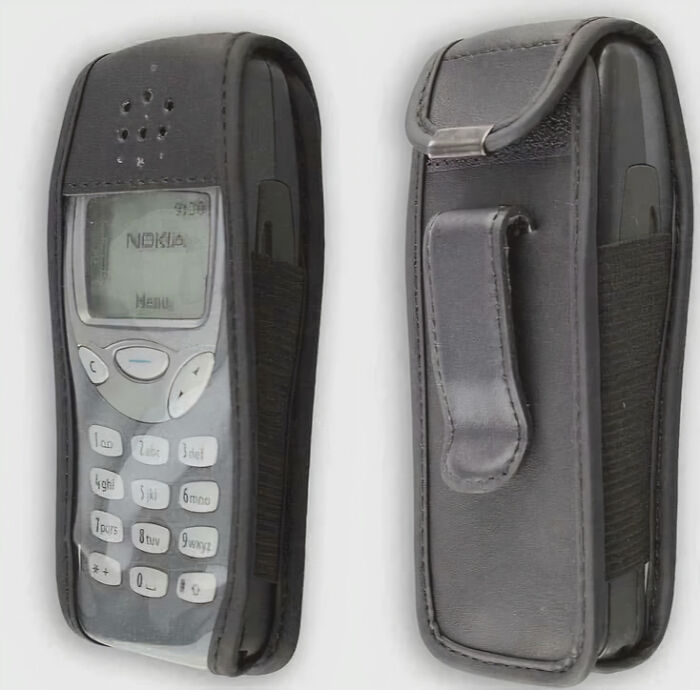 A black Nokia phone in a protective case, evoking nostalgic Aussie memories for many who grew up with it.
