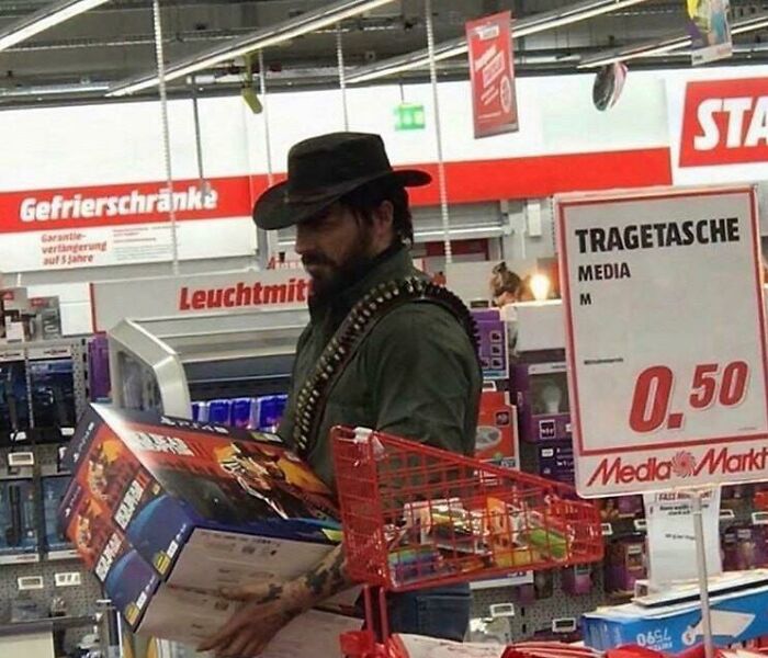 A man dressed like a cowboy, wearing a black hat and a bandolier, shopping for unhinged images.
