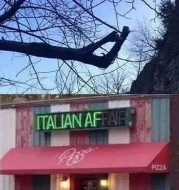 An optical illusion of a tree branch forming a hand, appearing to point at an Italian Affair pizza sign, showing something synced just right.