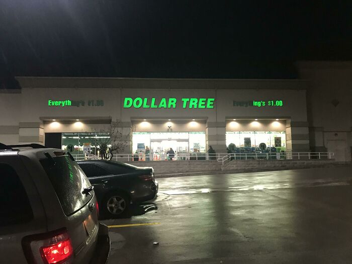 The Dollar Tree store sign at night, the green letters glowing and perfectly synced with the lighting below.
