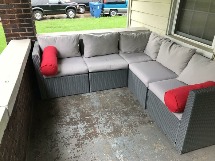 An outdoor sectional sofa perfectly synced to the corner of a porch, showcasing amazing times.