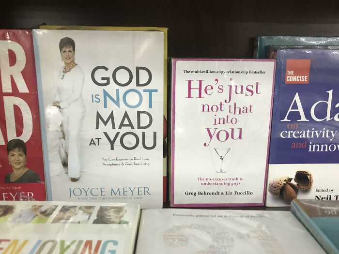 Books with perfectly synced titles and authors, showing amazing times something synced just right on a bookshelf.