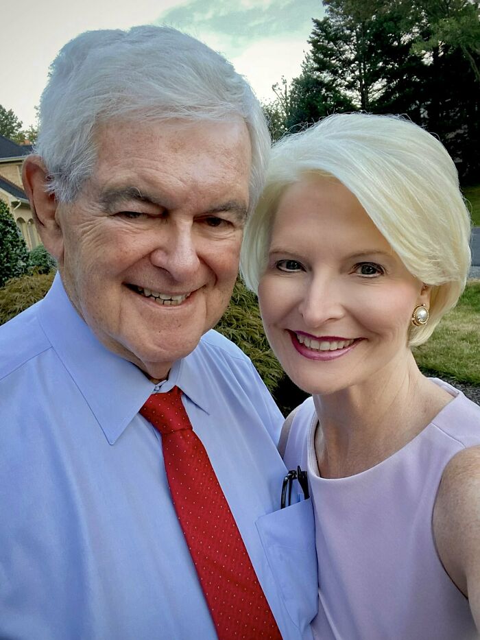 Newt Gingrich and his wife smile for a photo, highlighting a celebrity Photoshop fail.