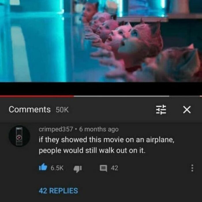 A screenshot from YouTube showing a funny comment about a movie playing on an airplane. The comment section is funnier.