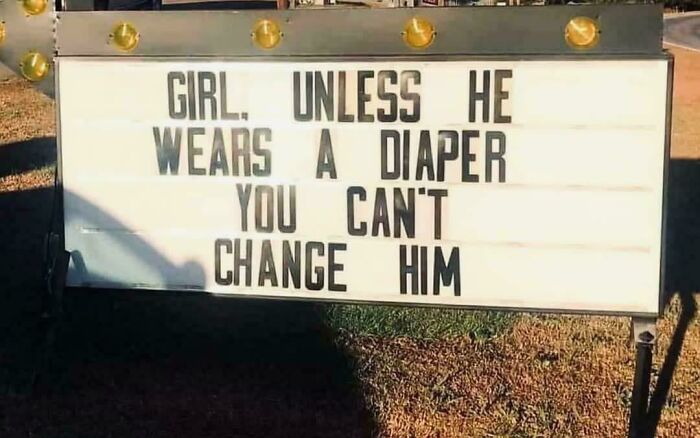A chaotic sign spotted in the wild with the text: Girl. Unless he wears a diaper you cant change him.